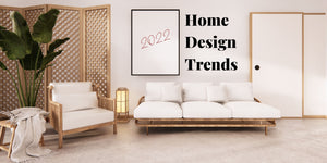 Hampton style living room with two couches and a big plant on the side with the title "Home Design Trends"