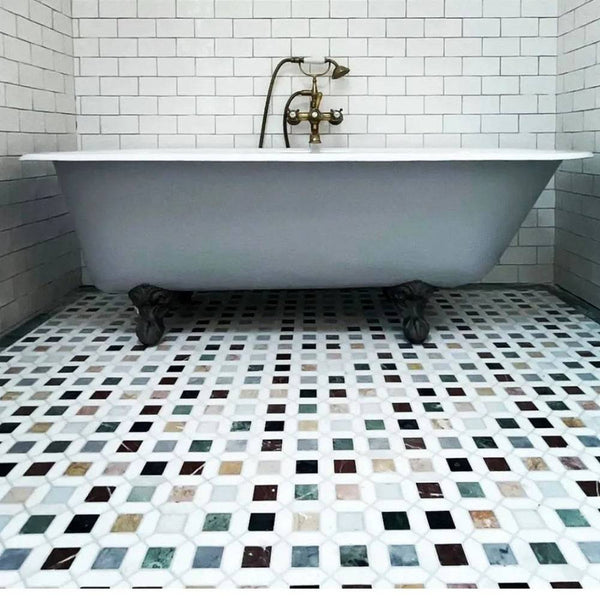 Vintage bathroom with clawfoot tub and Barcelona Marble Mosaic flooring featuring multicolour marble tiles and white subway tile walls.