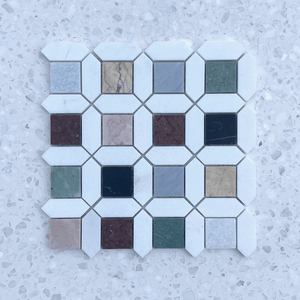Barcelona Marble Mosaic featuring multicoloured square marble inlays framed by white geometric borders.