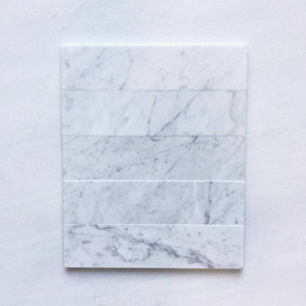 Carrara Bianco Herringbone 305x75 - Stone and Tile Projects